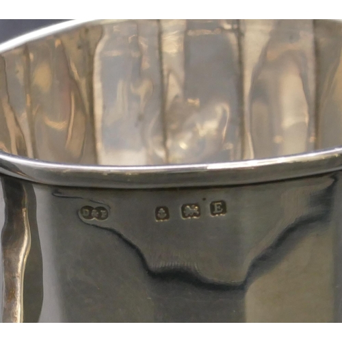 359 - A Birmingham silver christening mug with chamfer decoration, makers mark D & F, 2.4oz.