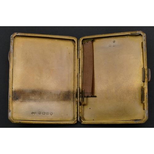 363 - A Birmingham silver small cigarette case with engine turn decoration, hinged front, 2.8oz.