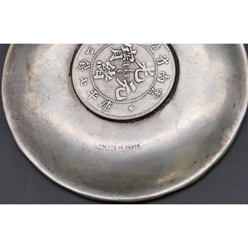 367 - An Oriental small dish with raised zodiac figures with centre, 10cm diameter.