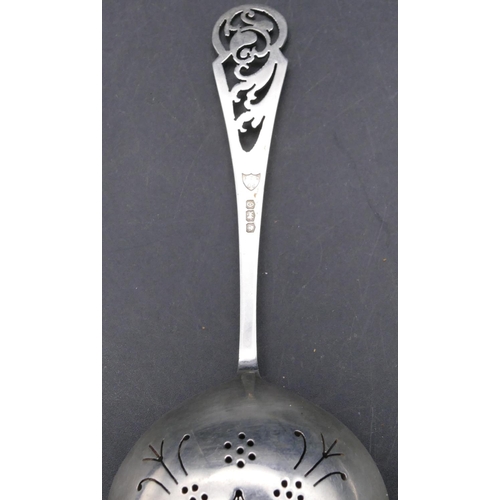 373 - A Sheffield silver tea strainer with pierced handle, 1.4oz