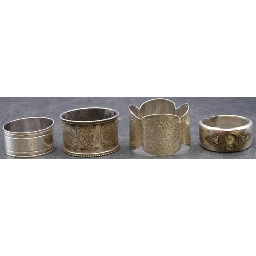 375 - 4 various odd silver round napkin rings, 3.3oz