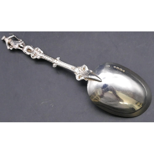 389 - A Victorian silver spoon with figure motif to handle, London 1864, 2.1oz