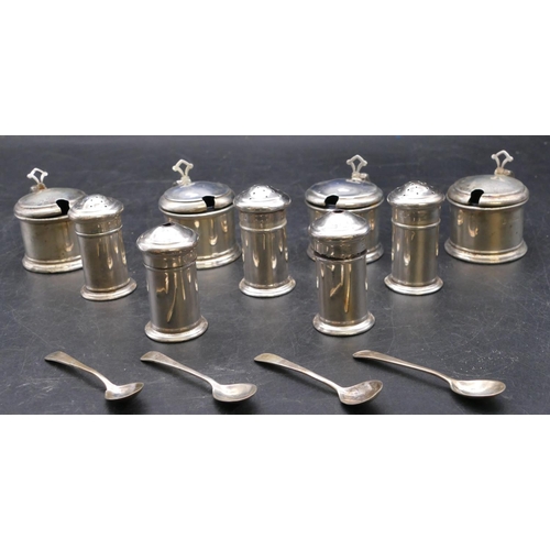 393 - A Birmingham silver large condiment set comprising of 4 mustard pots, 3 pepper pots, all with blue g... 