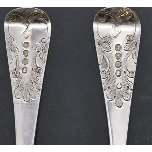 395 - A pair of George III silver berry spoons with embossed crinkled bowls and raised fruit decoration, e... 