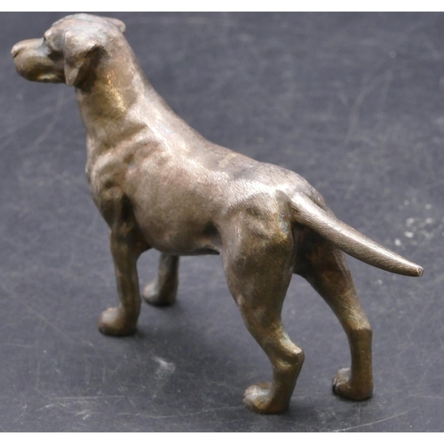 396 - An Elizabeth II silver model of a standing dog, London 1970, maker's mark EB, 13cm long, 9.9oz