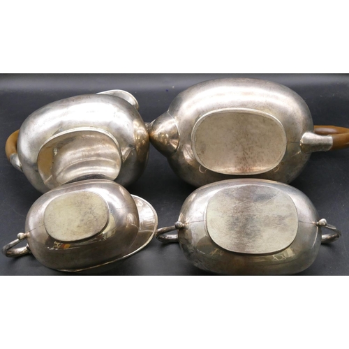 408 - A 4-piece George V silver rectangular bulbous shaped tea service comprising teapot and hot water jug... 