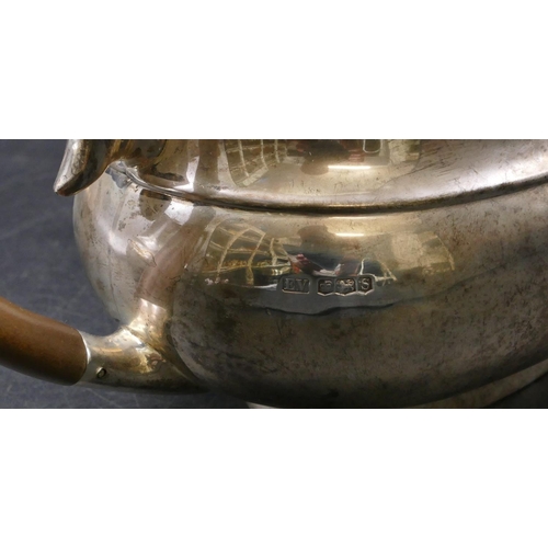 408 - A 4-piece George V silver rectangular bulbous shaped tea service comprising teapot and hot water jug... 