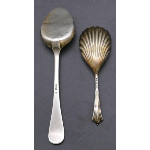 413 - A Sheffield silver caddy spoon with shell shaped bowl, a London silver jam spoon, maker's mark FH, 1... 