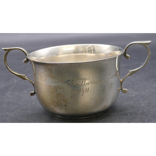 416 - An Edward VII silver round trumpet shaped 2-handled porringer with engraved inscription, London 1909... 