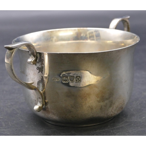 416 - An Edward VII silver round trumpet shaped 2-handled porringer with engraved inscription, London 1909... 