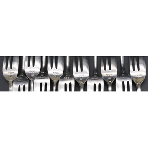 427 - A set of 11 Birmingham silver cake forks, maker's mark BBS Ltd., 9.3oz