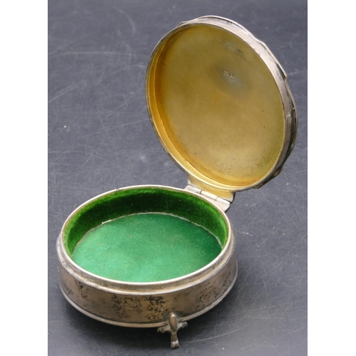 433 - A Birmingham silver round trinket box with scallop shaped hinged lid enclosing green velvet interior... 