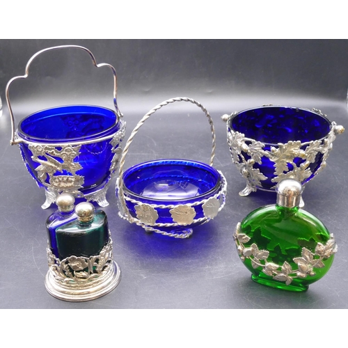 438 - 3 various silver plated sweetmeat dishes, all with blue glass liners with embossed bird, floral, aco... 