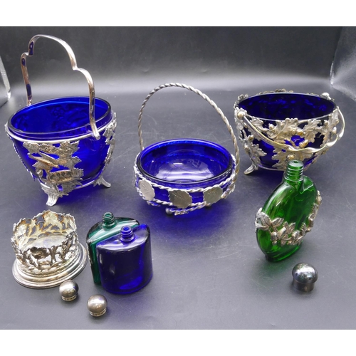 438 - 3 various silver plated sweetmeat dishes, all with blue glass liners with embossed bird, floral, aco... 