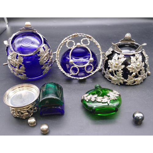 438 - 3 various silver plated sweetmeat dishes, all with blue glass liners with embossed bird, floral, aco... 