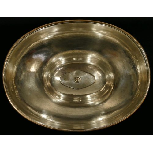 439 - An oval silver plated meat cover with centre carrying handle with engraved crest, 36cm diameter