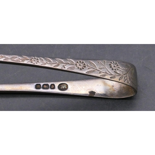 448 - A pair of Sheffield silver sugar tongs with engraved floral and leaf decoration and 4 odd Sheffield ... 