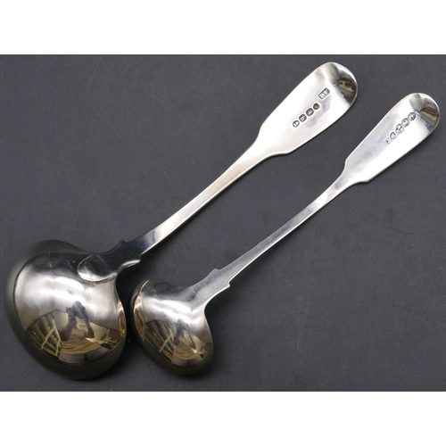 454 - A Victorian silver small sauce ladle, Newcastle 1846, maker's mark IW and a George IV silver sauce l... 