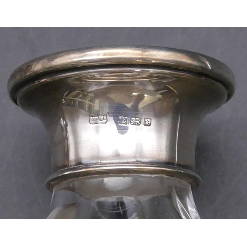 456 - A plain glass square scent bottle with stopper with Birmingham silver neck, 14.5cm high and a clear ... 