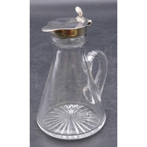 457 - A plain glass small Whisky jug with Birmingham silver hinged lid 