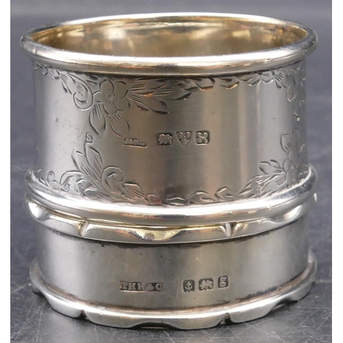 460 - A London small silver jug with embossed decoration, scroll handle and crinkled rim, 2 silver napkin ... 