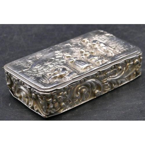 471 - An Edward VII silver rectangular shaped snuff box with hinged lid with allover embossed figure, flor... 