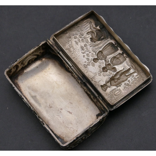 471 - An Edward VII silver rectangular shaped snuff box with hinged lid with allover embossed figure, flor... 