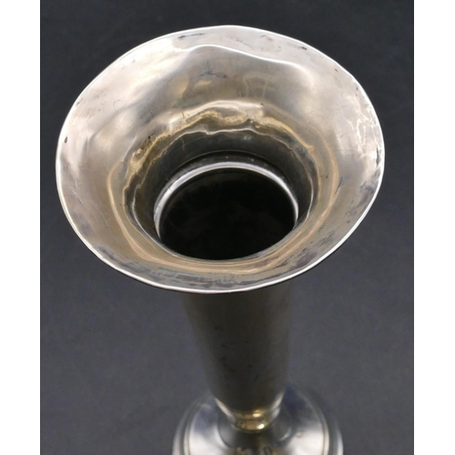 472 - A George V silver round trumpet shaped spill vase on weighted splayed base, Chester 1913, 21cm high ... 