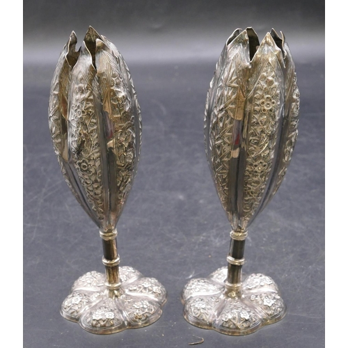 476 - A pair of Oriental silver-coloured metal round bulbous shaped spill vases with embossed figure, bamb... 