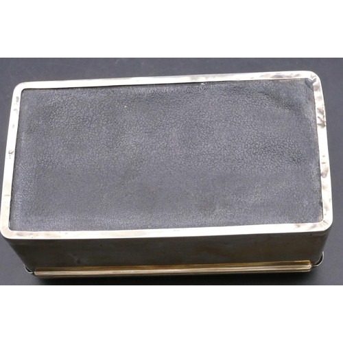 478 - A plain silver rectangular shaped cigarette box with hinged domed top enclosing cedar lined interior... 