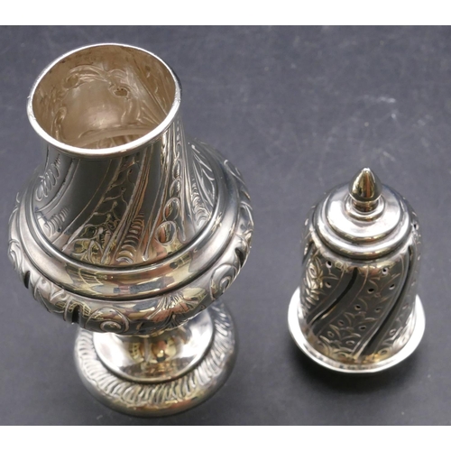 479 - A Victorian silver round bulbous shaped sugar caster with allover embossed floral, leaf and scroll d... 