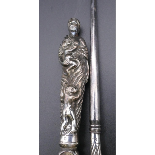 484 - A Victorian silver handled shoehorn in the form of a mother with 3 children, London 1887 and a Birmi... 