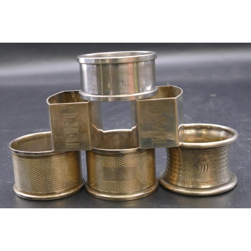 487 - A pair of plain Birmingham silver rectangular shaped napkin rings, maker's mark J.H&S, with engraved... 