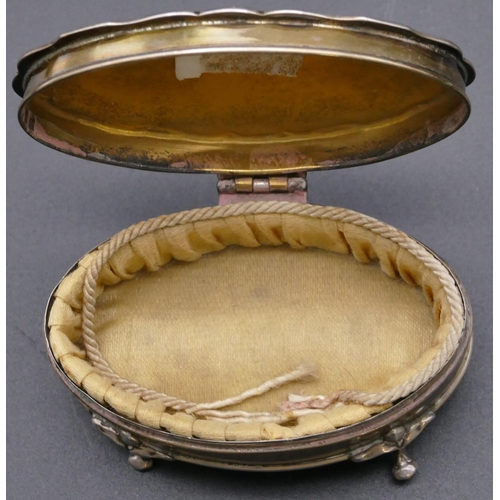 489 - A Birmingham silver trinket box with scallop shaped hinged top enclosing silk interior on splayed fe... 