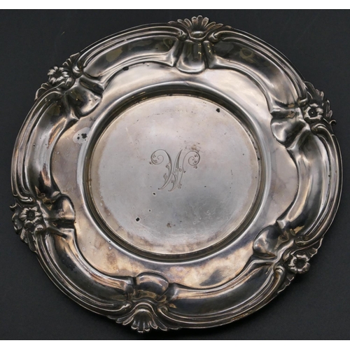 492 - A Victorian silver round scallop shaped dish with raised scroll and floral rim, Sheffield 1846, make... 