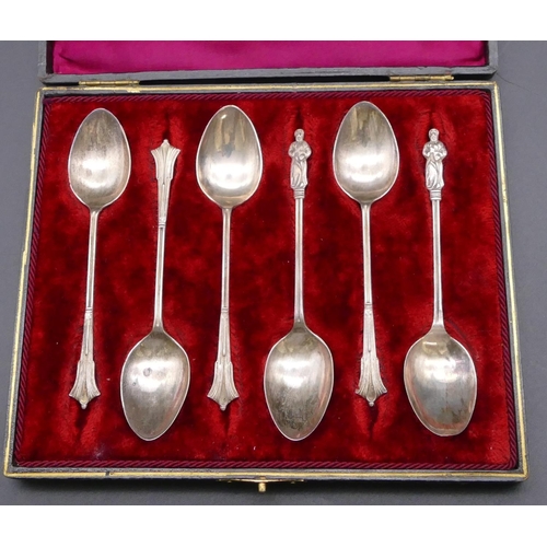 495 - A set of 4 Birmingham silver teaspoons and a pair of Birmingham silver Apostle teaspoons in black le... 