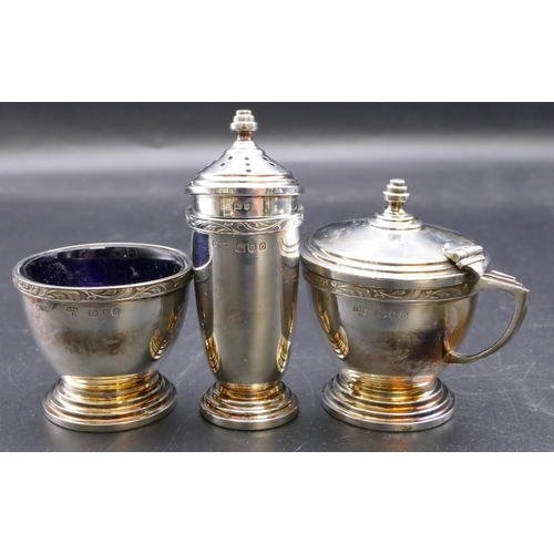 498 - A 3-piece modern London silver condiment set, mustard pot with blue glass liner, salt with blue glas... 