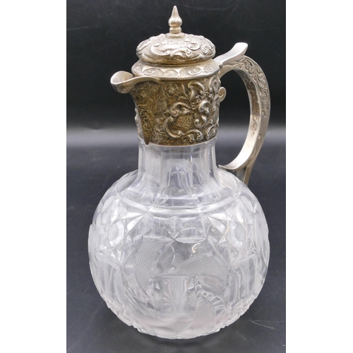 501 - A late Victorian cut glass round bulbous shaped claret jug with silver neck, scroll handle and hinge... 