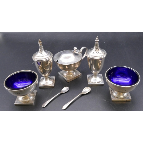 502 - A George V 5-piece condiment set, mustard pot with blue glass liner, a pair of salts with blue glass... 