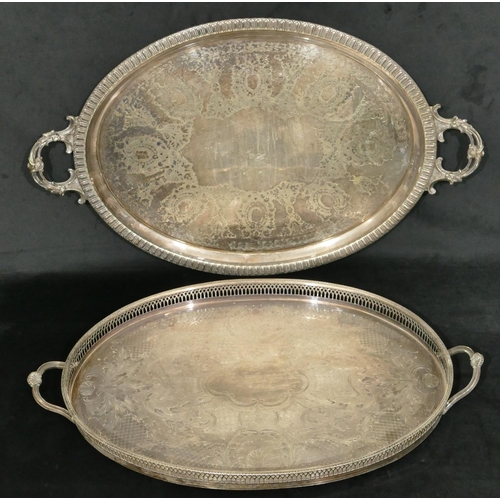 503 - A Walker & Hall silver plated oval tray with engraved decoration, 65cm wide and another silver plate... 