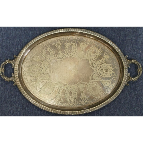 503 - A Walker & Hall silver plated oval tray with engraved decoration, 65cm wide and another silver plate... 