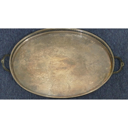 503 - A Walker & Hall silver plated oval tray with engraved decoration, 65cm wide and another silver plate... 