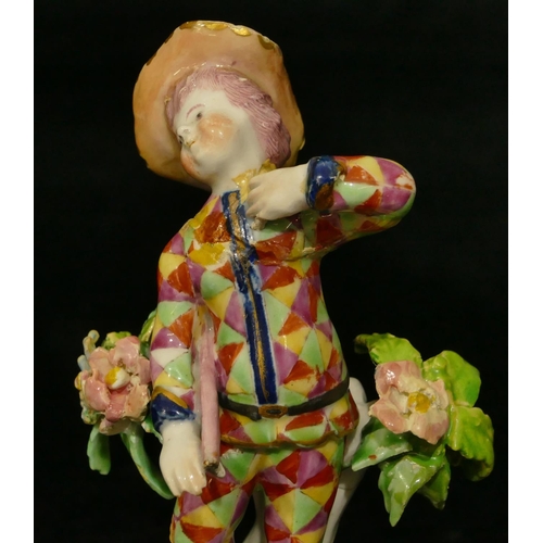 60 - A 19th Century Derby figure of a pirouette holding a stick (neck and chest restored, end of stick mi... 