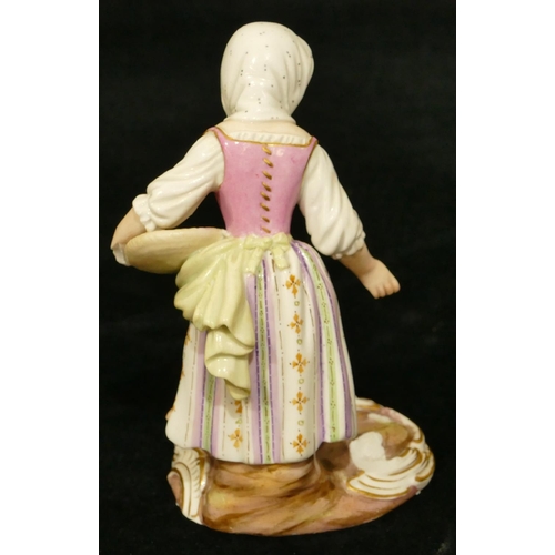 64 - A Meissen porcelain figure of a girl feeding birds (pieces missing to base), 12.5cm high