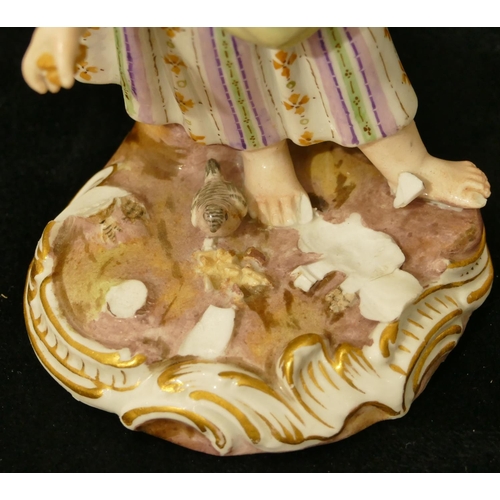 64 - A Meissen porcelain figure of a girl feeding birds (pieces missing to base), 12.5cm high