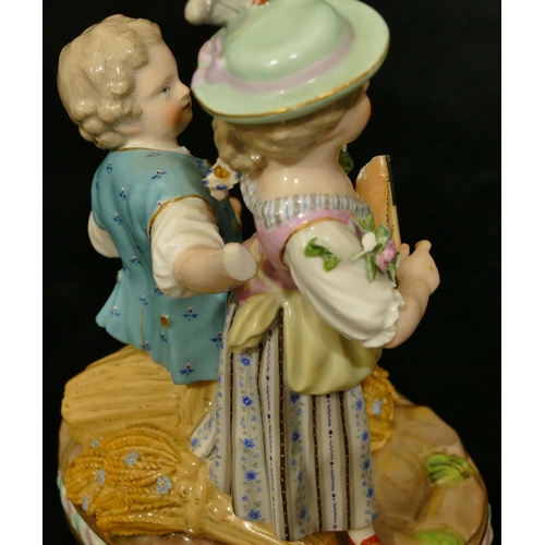 68 - A Meissen group of seated boy and standing girl playing mandolin (part to plumage, end to mandolin, ... 