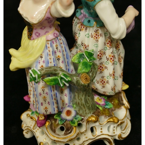 71 - A Meissen small oval sweetmeat dish in the form of 2 ladies holding oval shell aloft (encrusted flow... 