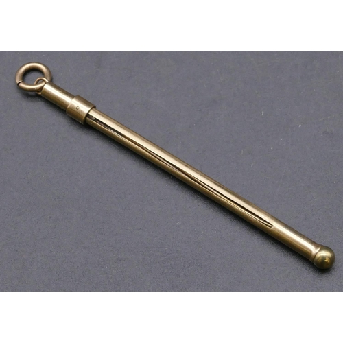 712 - A gold swivel stick, 5.37 grams gross (boxed)