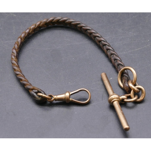 720 - A leather fob with 9ct gold clip end and mounted with 9ct gold T-bar