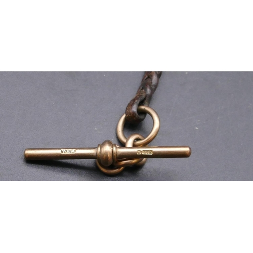 720 - A leather fob with 9ct gold clip end and mounted with 9ct gold T-bar